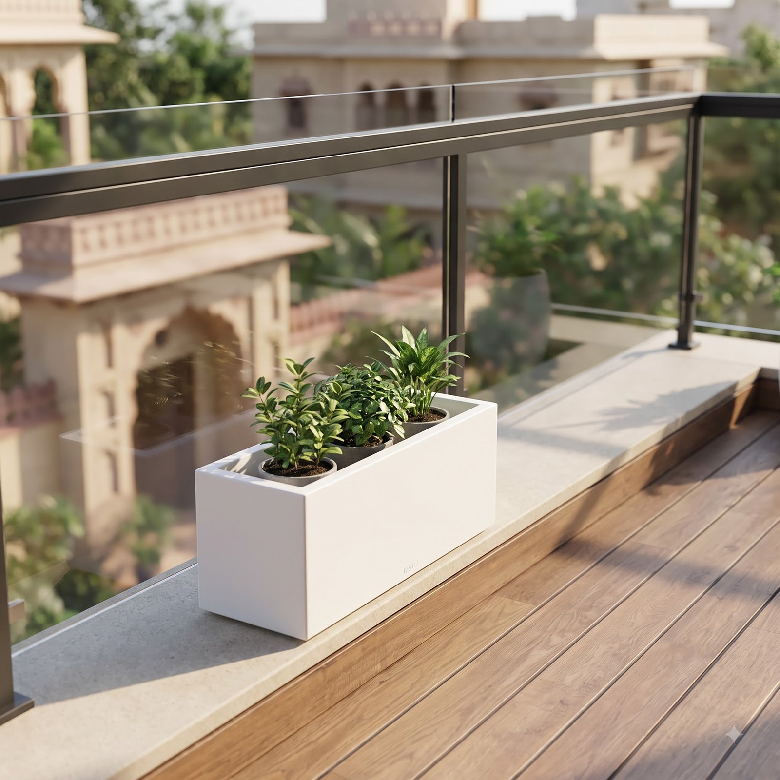 Sleek narrow rectangular planter on modern glass balcony