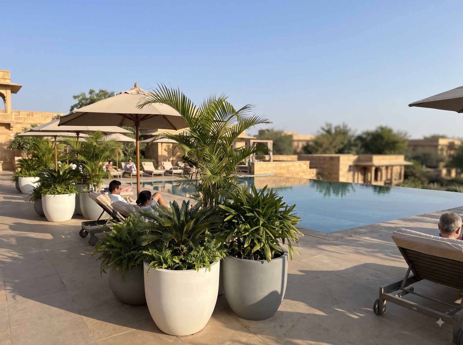 Resort pool with FRP planters