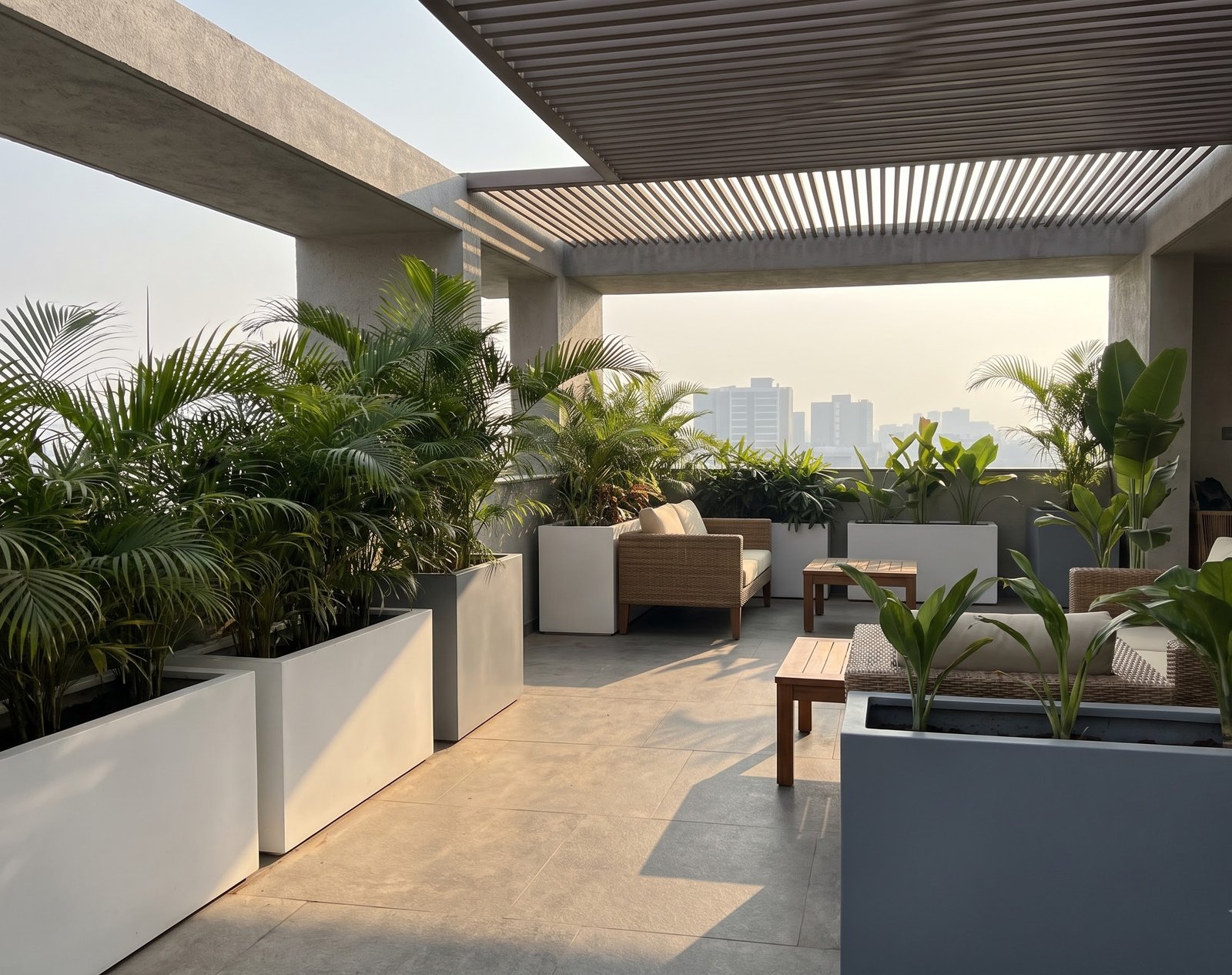 Tropical rooftop design featuring bold fiber planters